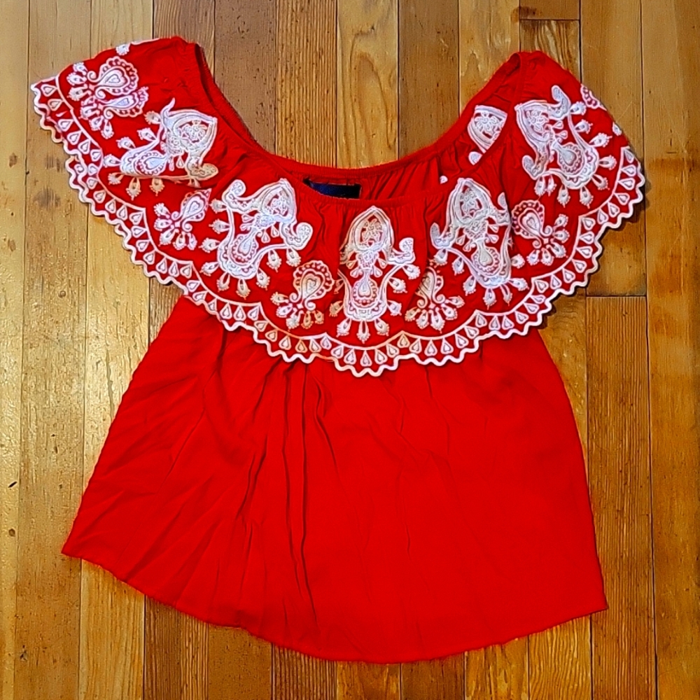 Red off the shoulder shirt